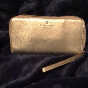 Gold gently used Kate Spade wristlet